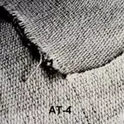 Ткань асбестовая представляет собой полотно из переплетённых асбестовых нитей, содержащих от 5 до 18 % связующего волокна (вискозы, хлопка, лавсана).  Асбестовые ткани применяются  в качестве теплоизоляционного и прокладочного материала. 
